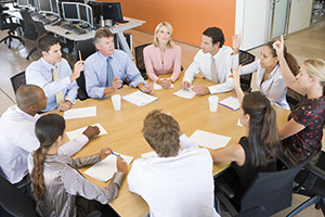 sitting in meetings